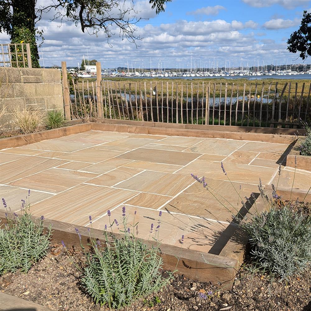 Classic sunset buff sandstone paving pack with a planting border
